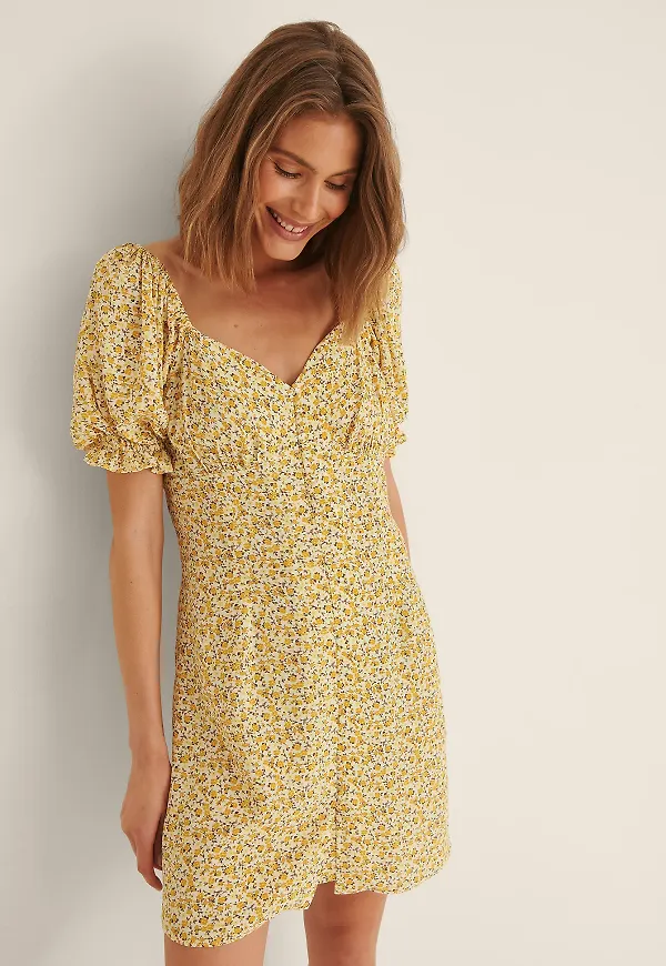 NA-KD Prairie miniklänning med knappar - Yellow