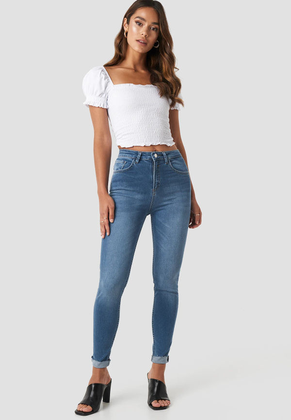 NA-KD Skinny jeans med hög midja och rå fåll - Blue