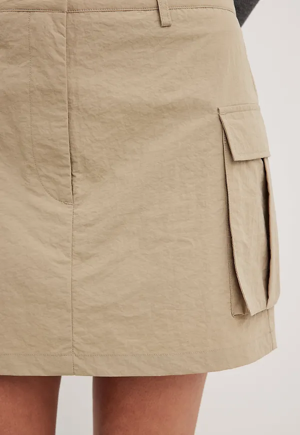 NA-KD Minikjol med fickdetalj - Beige
