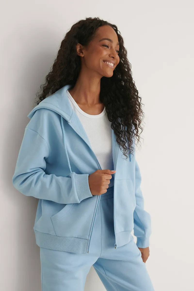 Pelican Bay x NA-KD Sweater Med Dragkedja Och Ficka Fram - Blue