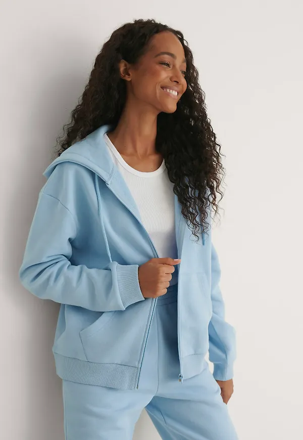 Pelican Bay x NA-KD Sweater Med Dragkedja Och Ficka Fram - Blue