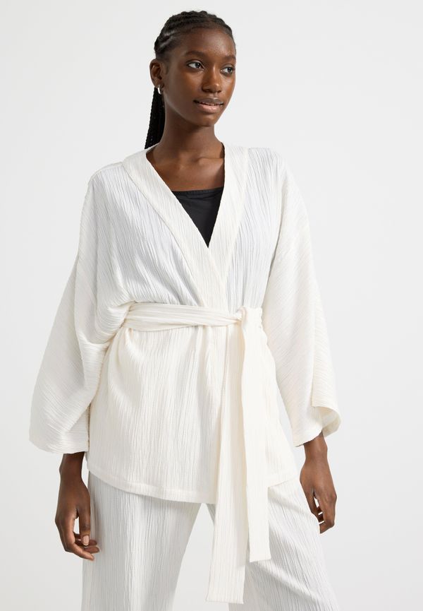 Plisserad kimono