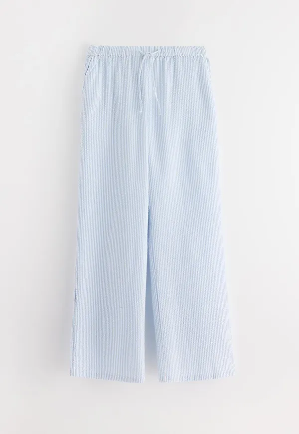 Pyjamasbyxor i bäckebölja med längre ben