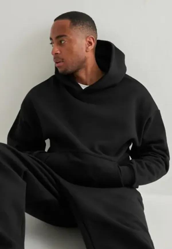 Que Sera Sera Cozy Hoodie Hoodies Svart