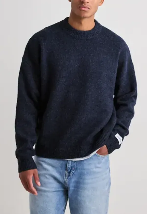 Que Sera Sera Graham Solid Knit Stickade tröjor Blå