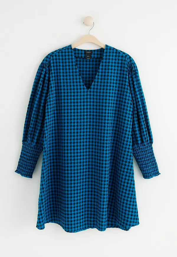 Rutig klänning med puffärm i bomull