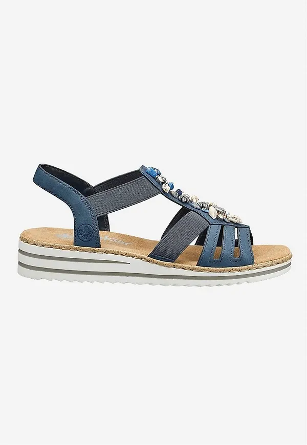Sandal med dekorativa snäckskal och stenar