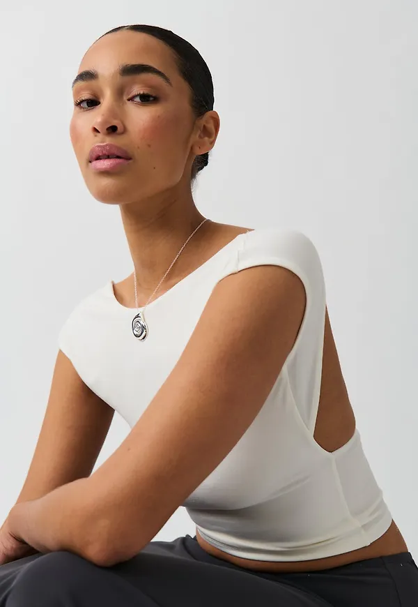 Soft touch open back top