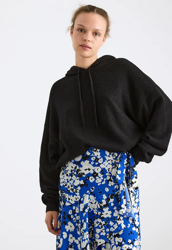 Stickad hoodie