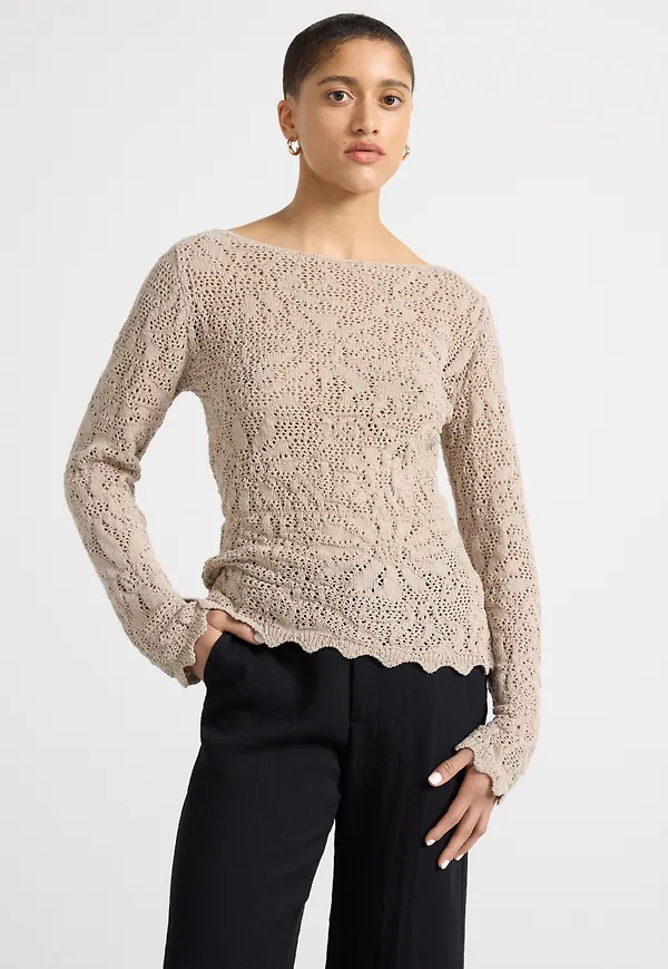 Stickad Peplum tröja