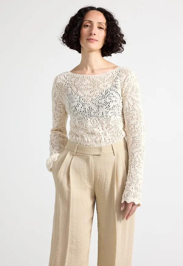 Stickad Peplum tröja