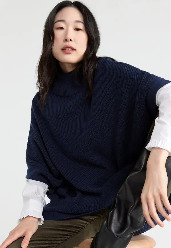 Stickad poncho