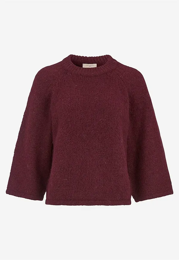 Stickad tröja med raglanärmar