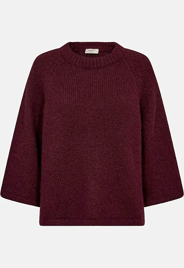 Stickad tröja med raglanärmar