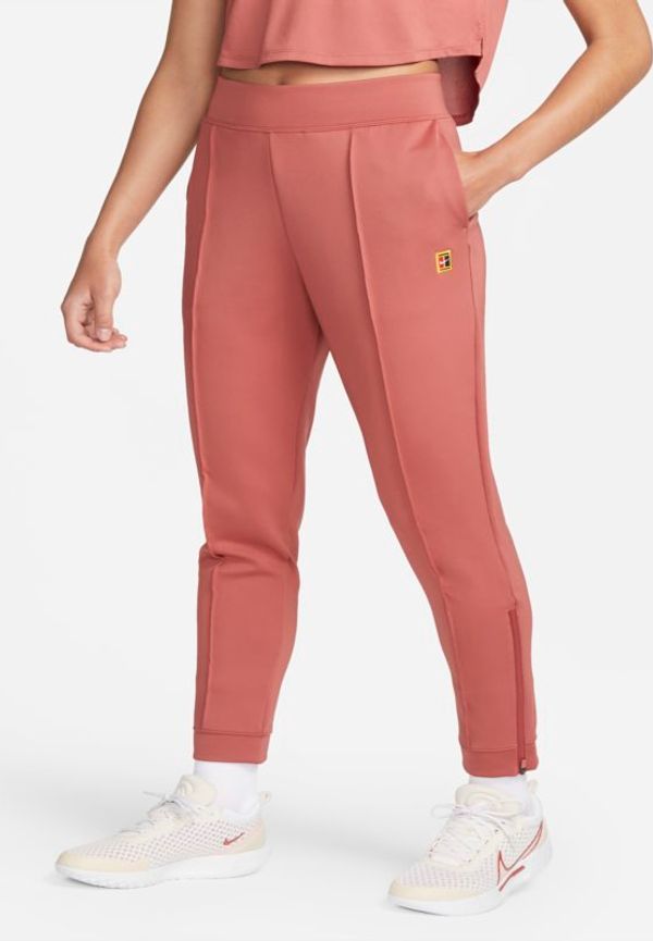 Stickade tennisbyxor NikeCourt Dri-FIT för kvinnor - Röd