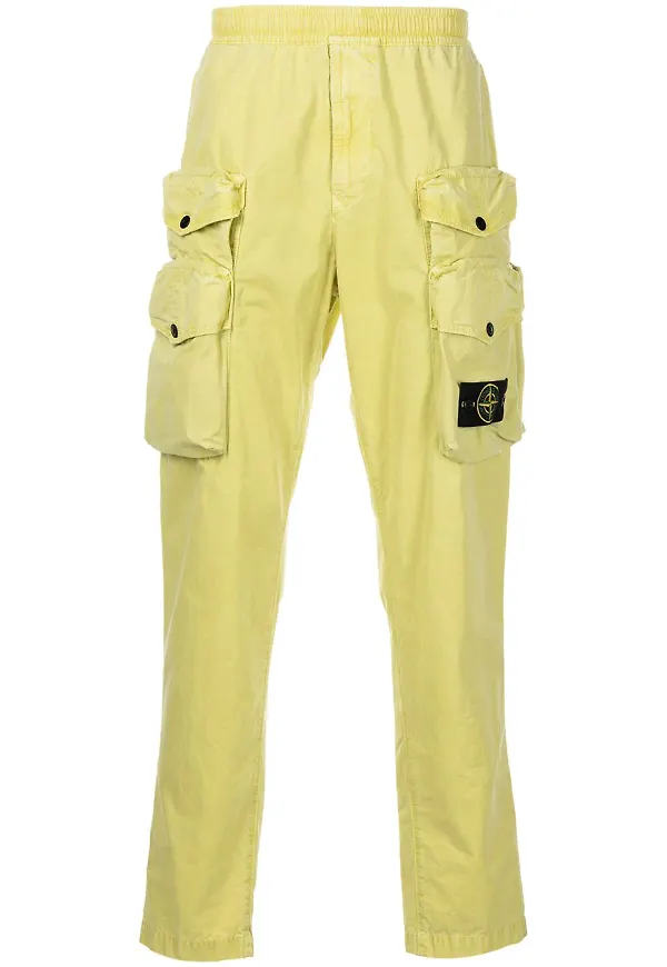 Stone Island byxor med logotyp - Gul