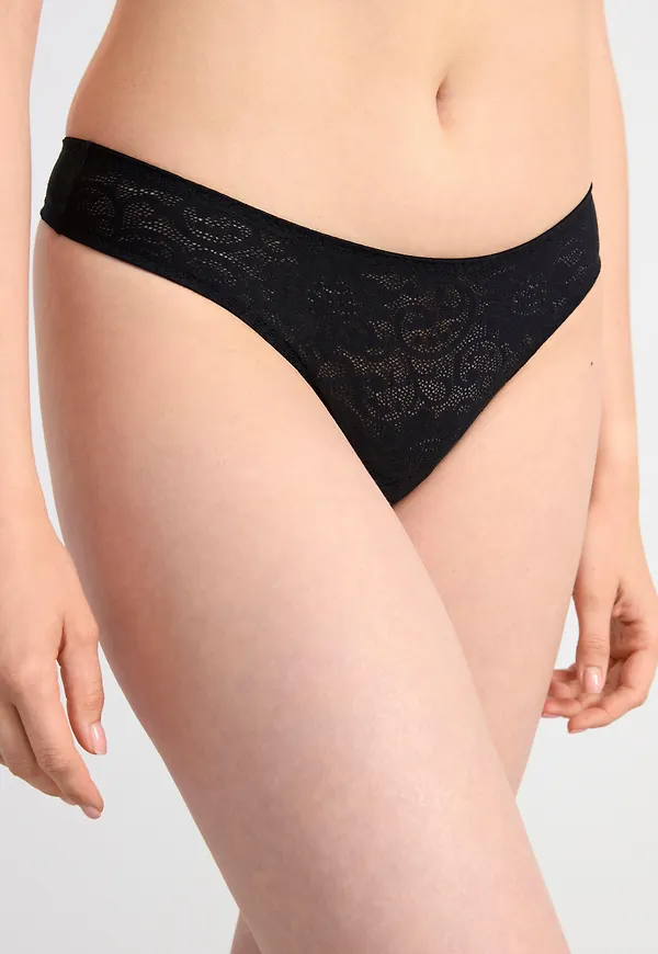 Stringtrosa med normalhög midja och spets