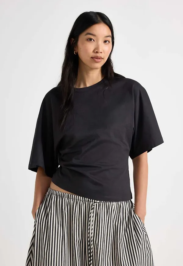 T-shirt med vida ärmar