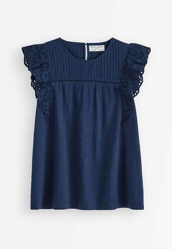 Topp med broderie anglaise