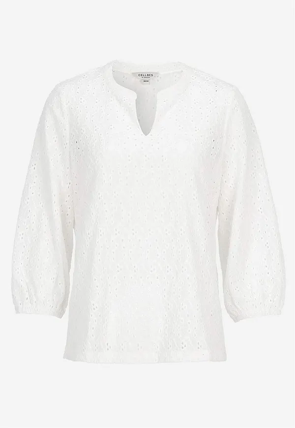 Trikåtopp med broderat hålmönster
