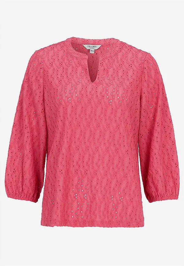 Trikåtopp med broderat hålmönster