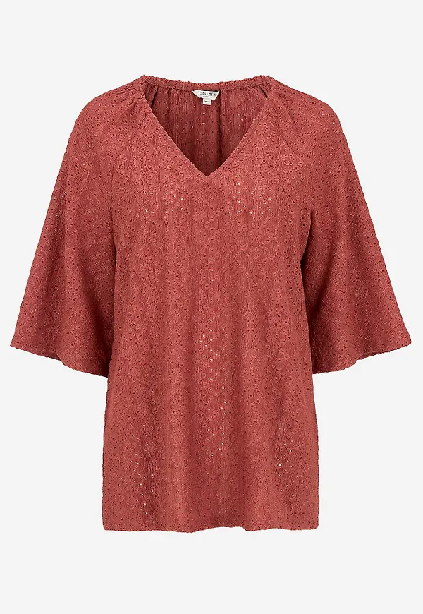 Trikåtunika med hålbroderi