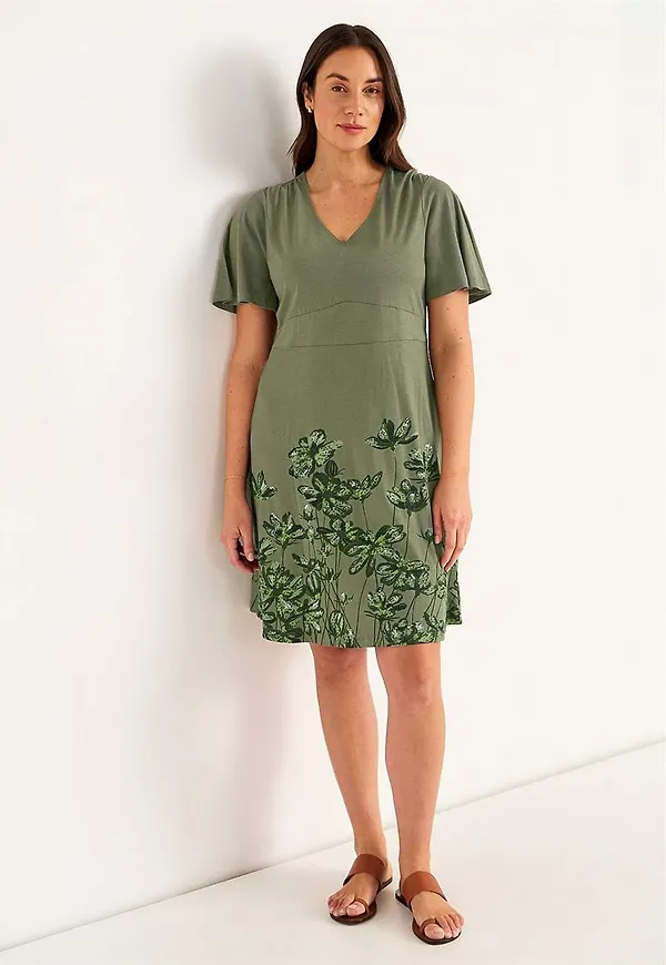 Trikåklänning med blommönster