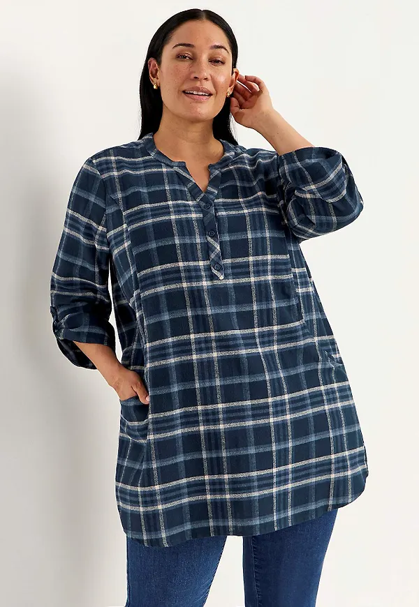 Tunika i flanell med fickor