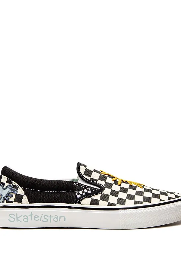 Vans x Skateistan klassiska slip on-sneakers - Svart