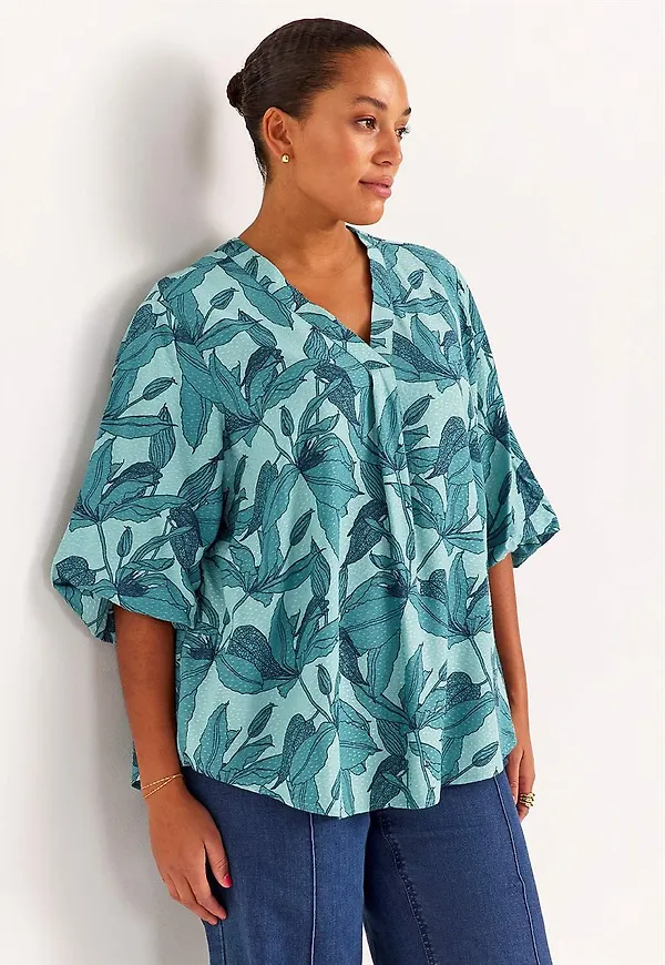Vävd blus med puffärm