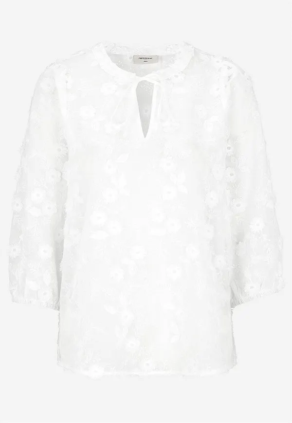 Vävd blus med brodyr