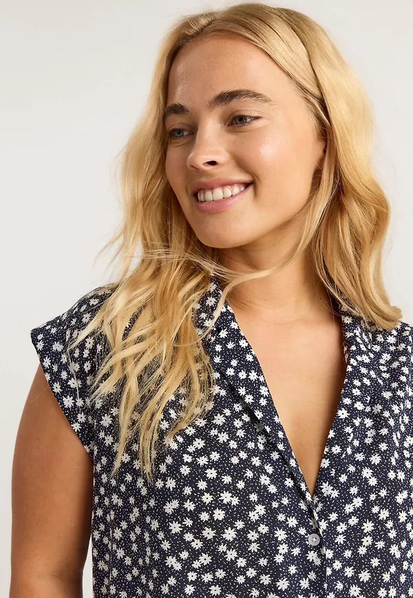 Ärmlös blus