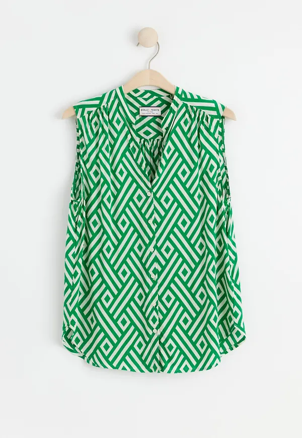 Ärmlös blus med mönster