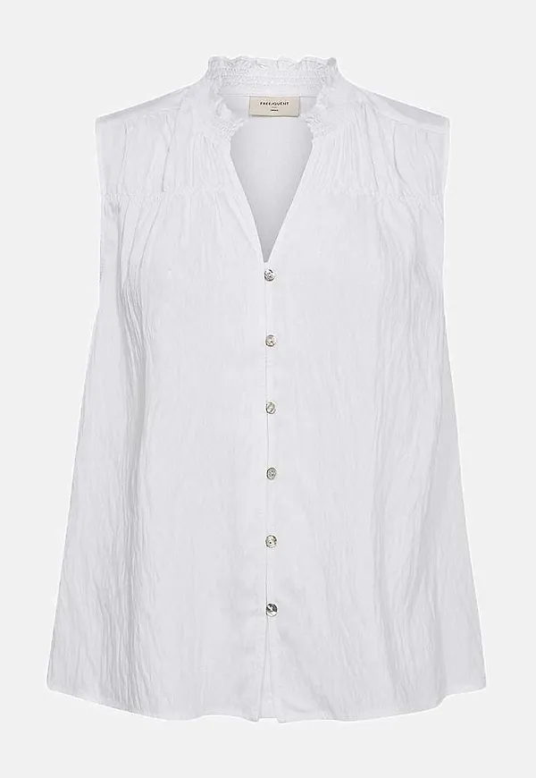 Ärmlös blus med rynkdetaljer