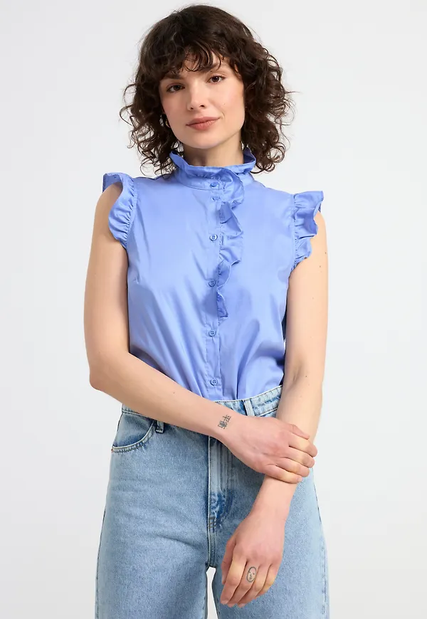 Ärmlös blus med volanger
